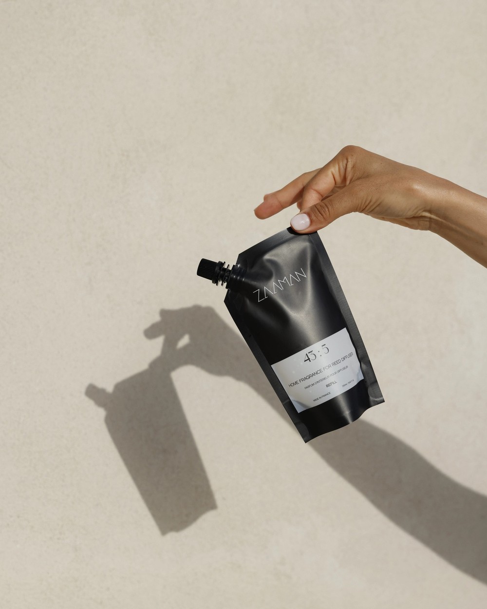 Zaaman 43:5 refill pouch held in hand, outdoor