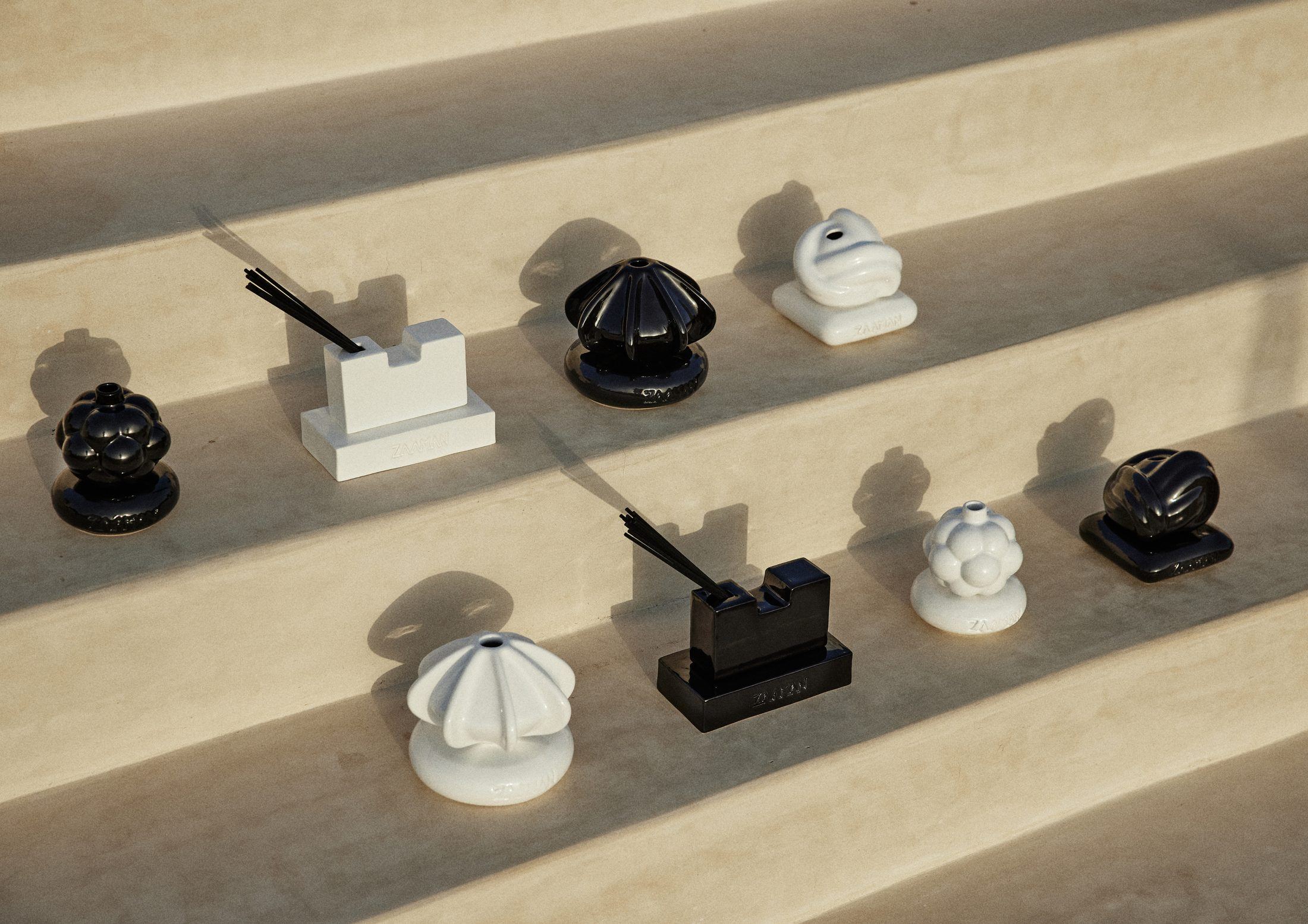 Zaaman ceramic vessel collection, sunlit stone steps